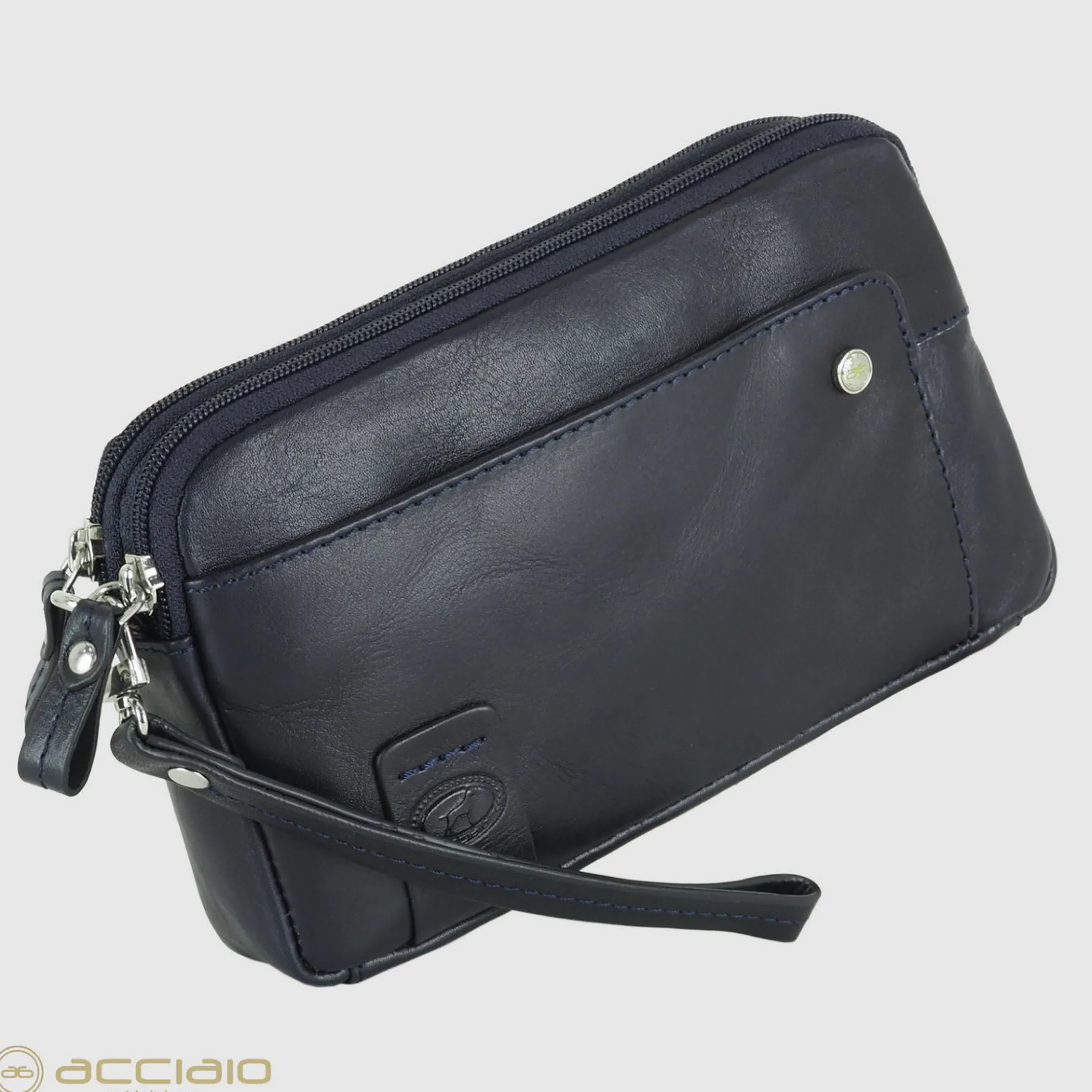pochette_uomo_in_pelle__v_2.webp Pochette Uomo in pelle 2 vani zip borsello a mano Harry 7" Blu