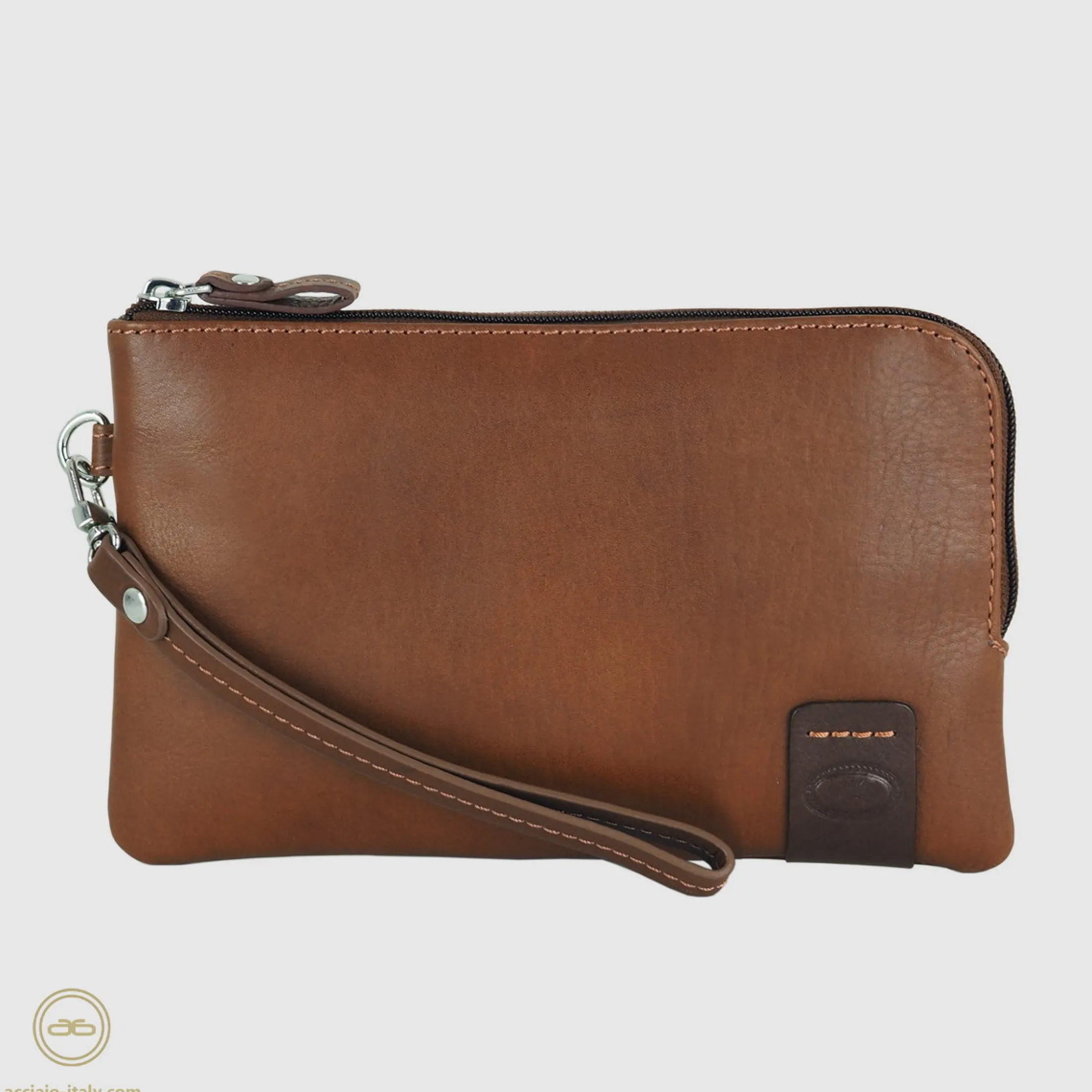 pochette_uomo_piccola_in__0-1.webp Pochette Uomo piccola in pelle borsello a mano Thomas 7" Castagno