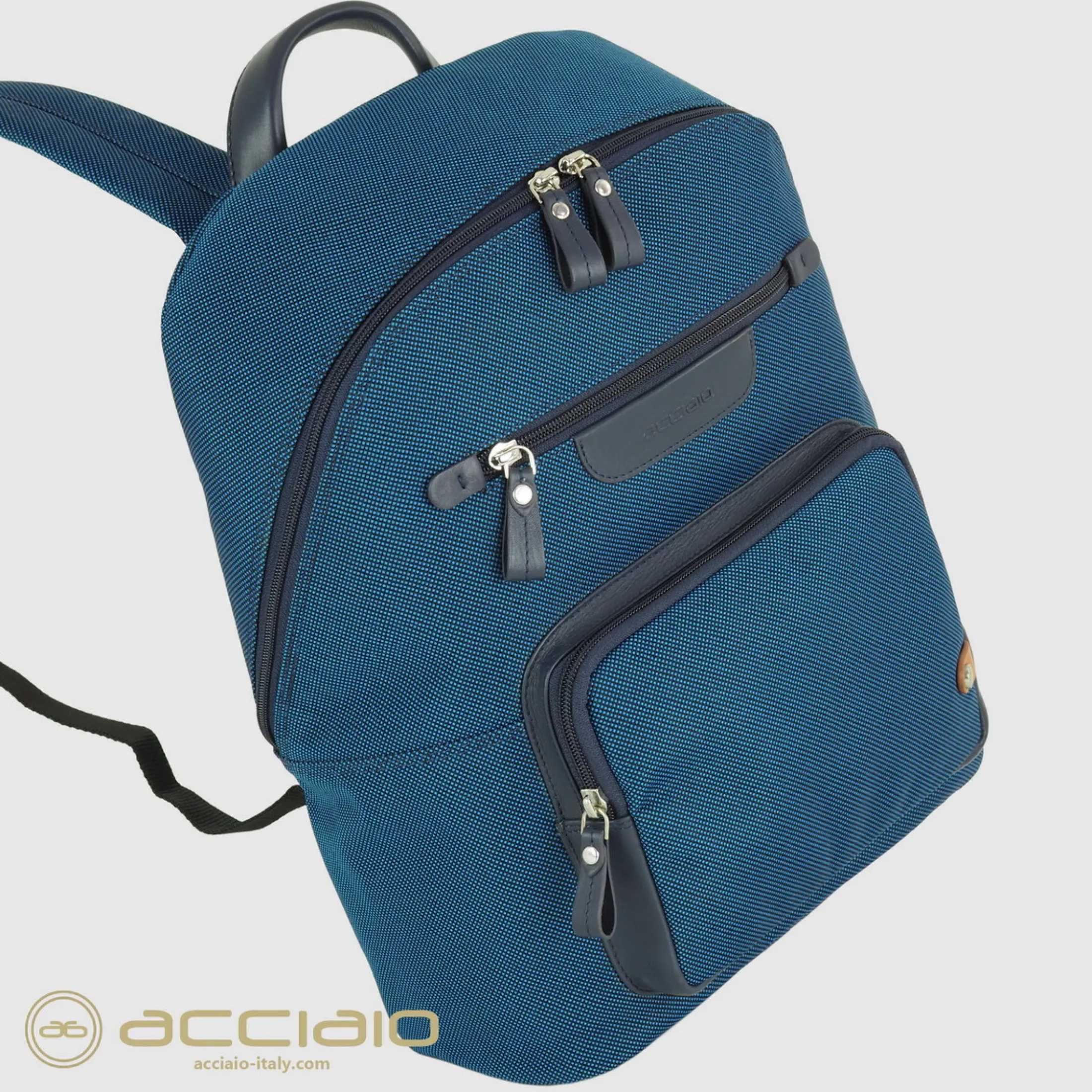 zaino_porta_pc_piccolo_ge_2-3.webp Zaino porta pc piccolo Geo 13" tessuto e pelle Blu Cobalto